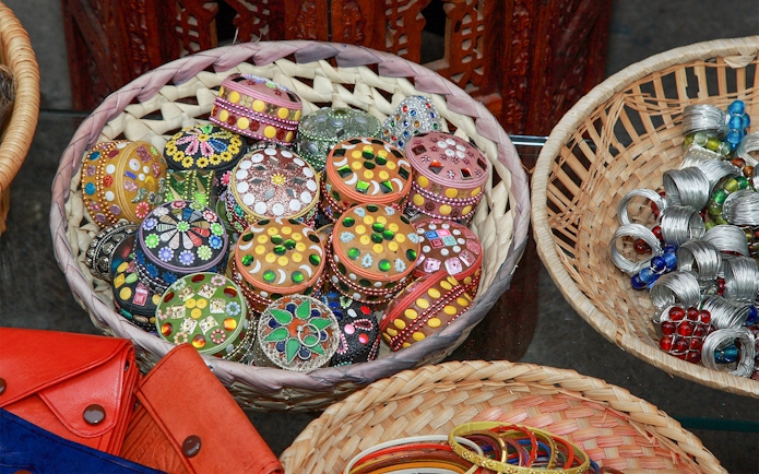 Colorful handcrafted boxes and jewelry at Granada's Silk Market.