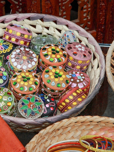Colorful handcrafted boxes and jewelry at Granada's Silk Market.