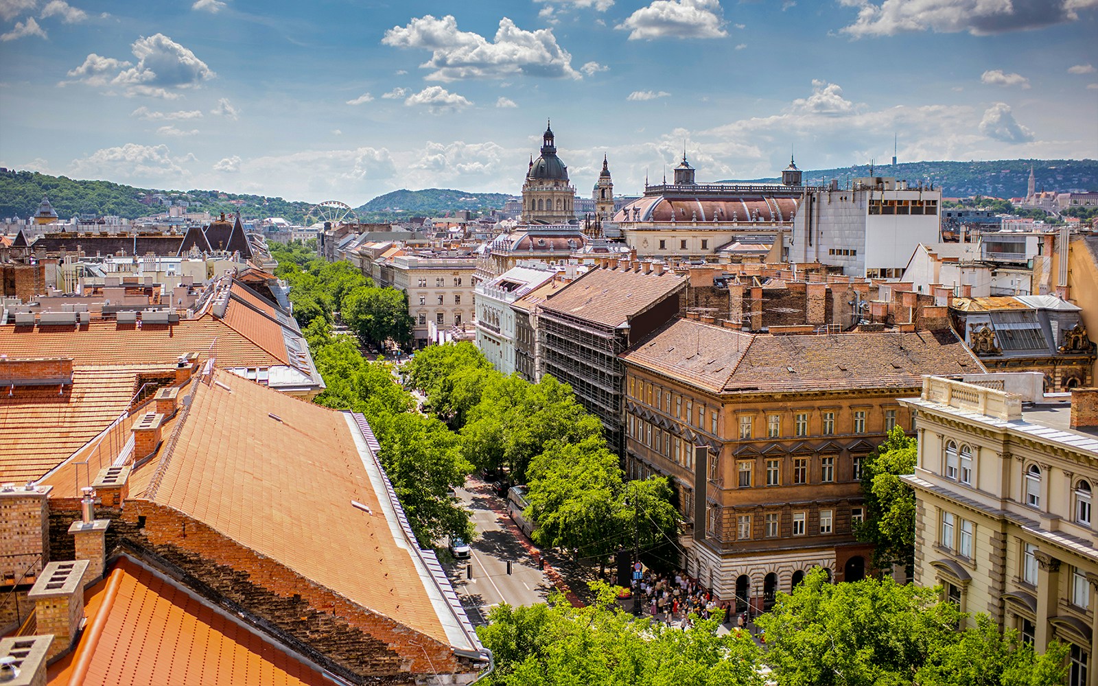 Top view on Andrassy avenue with old residential buildings and saint Stephen church Hop-on Hop-off Budapest