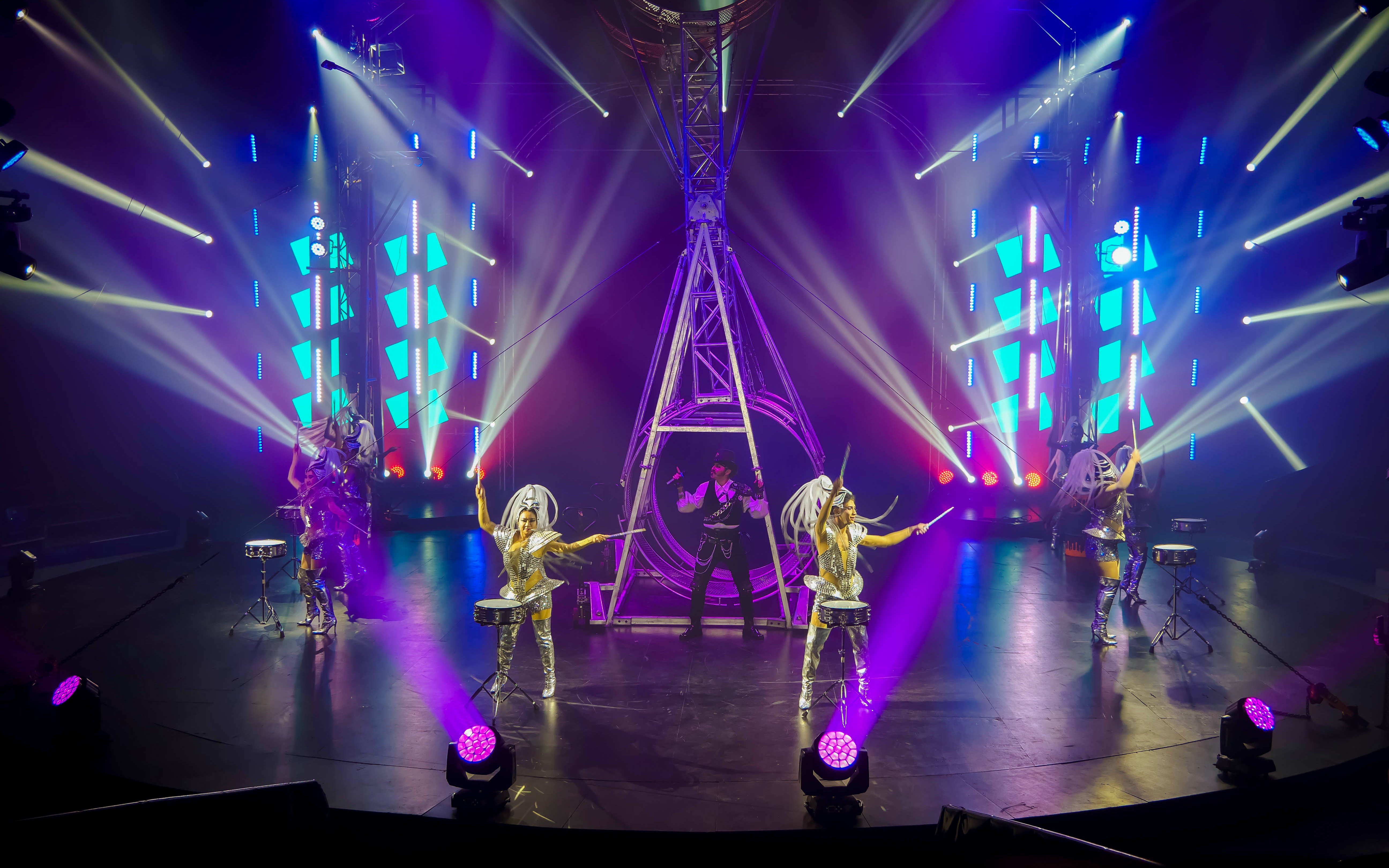 Performers in vibrant costumes at Aqua Circus Phuket show.