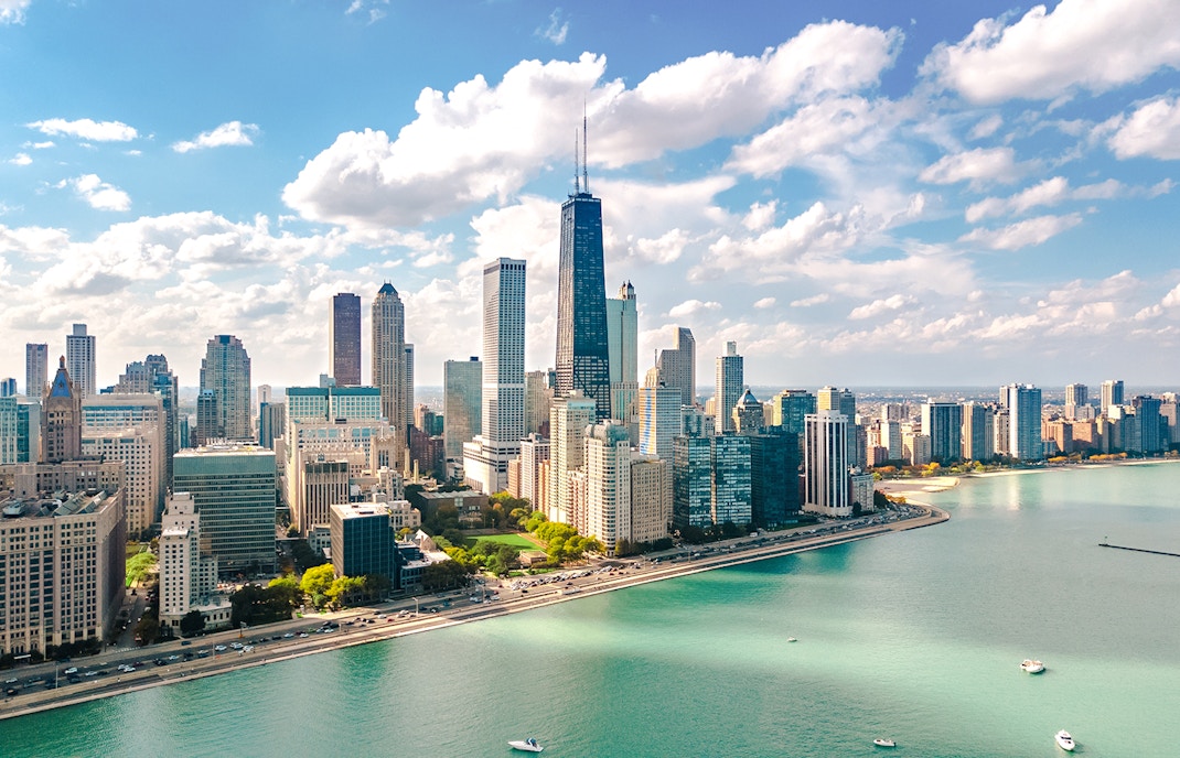 Chicago skyline aerial view with skyscrapers and Lake Michigan.