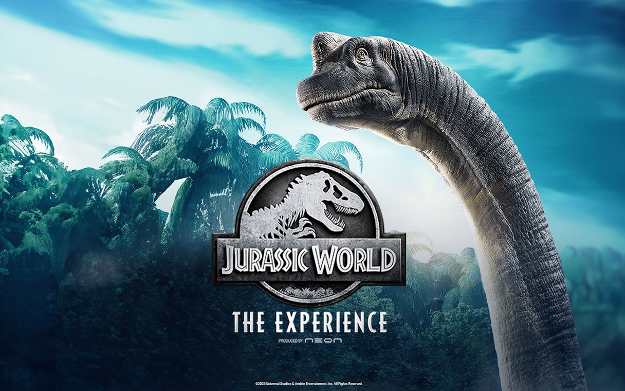 Dinosaur and logo for Jurassic World: The Experience with jungle backdrop.