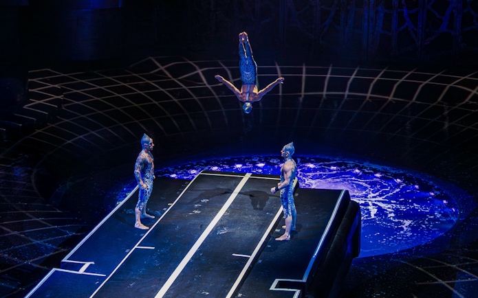 Acrobats performing a dive at La Perle show in Dubai.