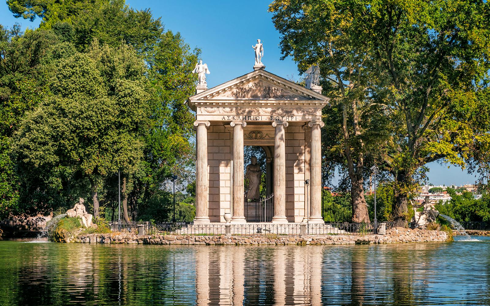 Borghese Gallery temple surrounded by trees and water in Rome.