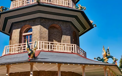 Great Pagoda at Kew Gardens with ornate dragon sculptures, London.