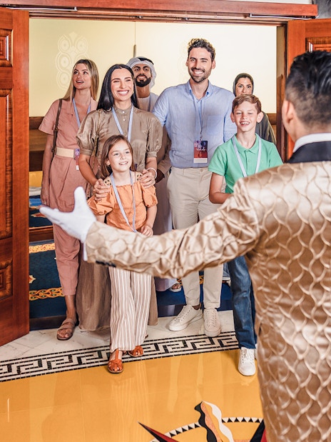 Butler welcoming guests inside Burj Al Arab, Dubai tour.