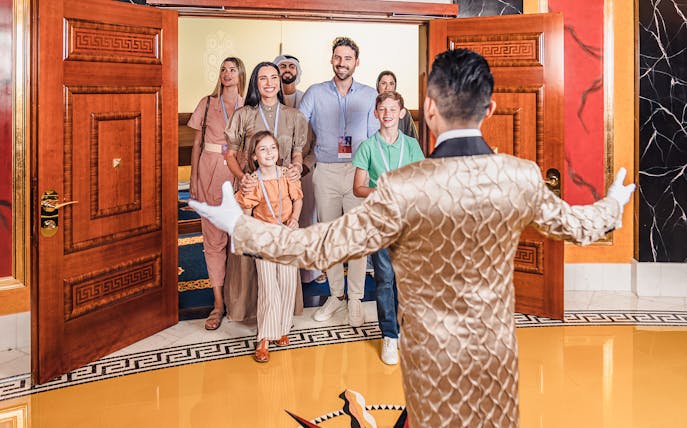 Butler welcoming guests inside Burj Al Arab, Dubai tour.
