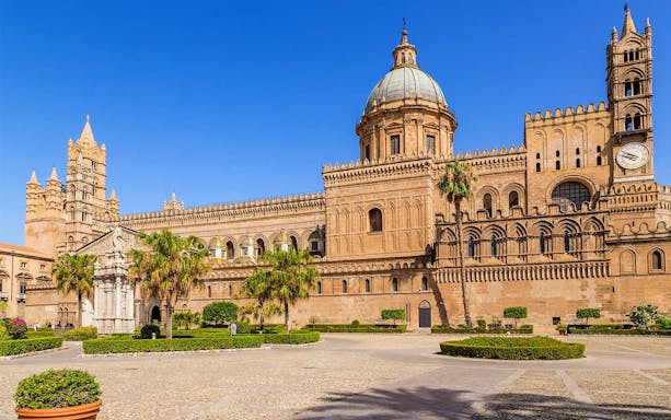 Monreale Cathedral exterior with intricate architecture in Palermo, Italy.