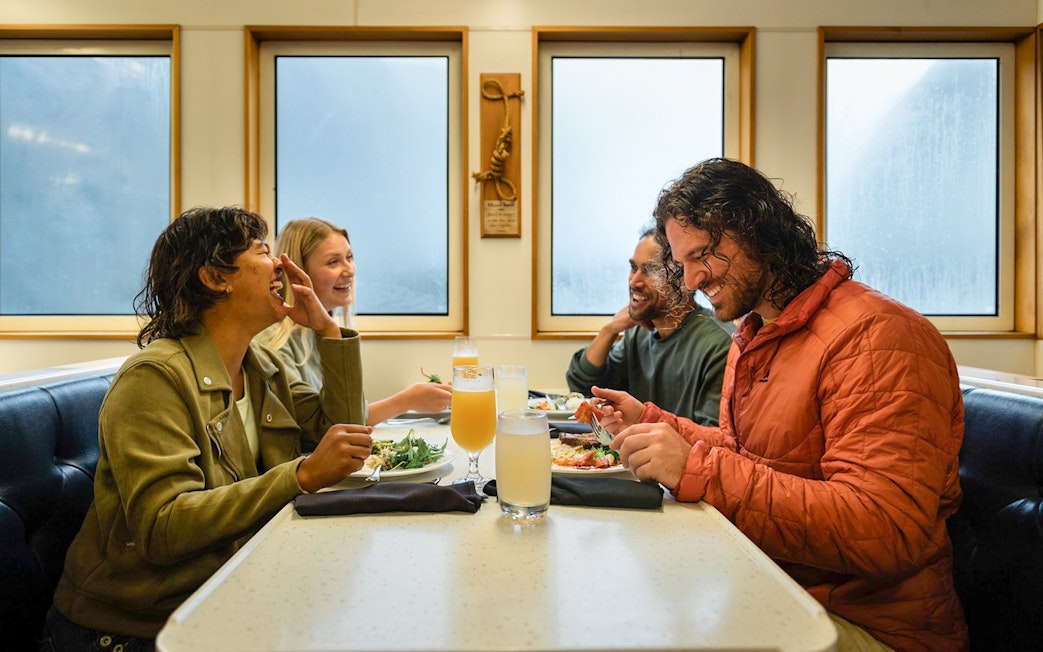 Group dining on Milford Sound cruise ship.