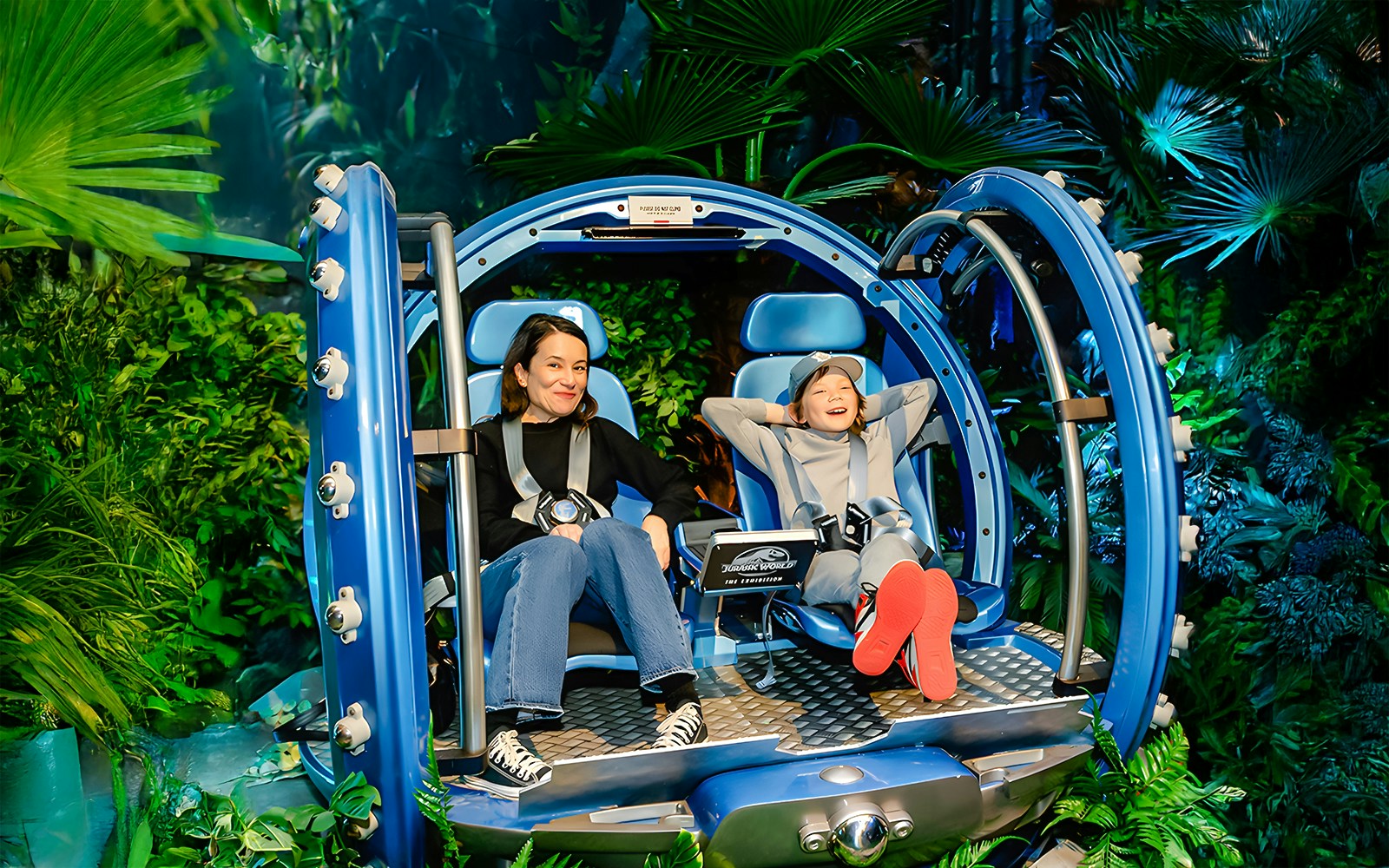 Visitors enjoying a Jurassic World ride experience in London.