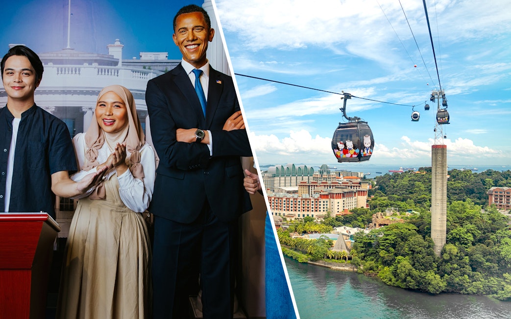 Visitors with Obama wax figure at Madame Tussauds Singapore.