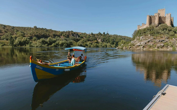 Boat ride near Castle of Almourol on the Tagus River in Tomar, Portugal.