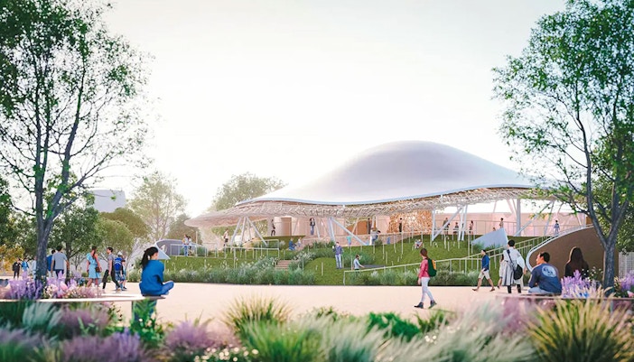 Futuristic pavilion at Expo 2025 Osaka, Kansai with visitors exploring the site.