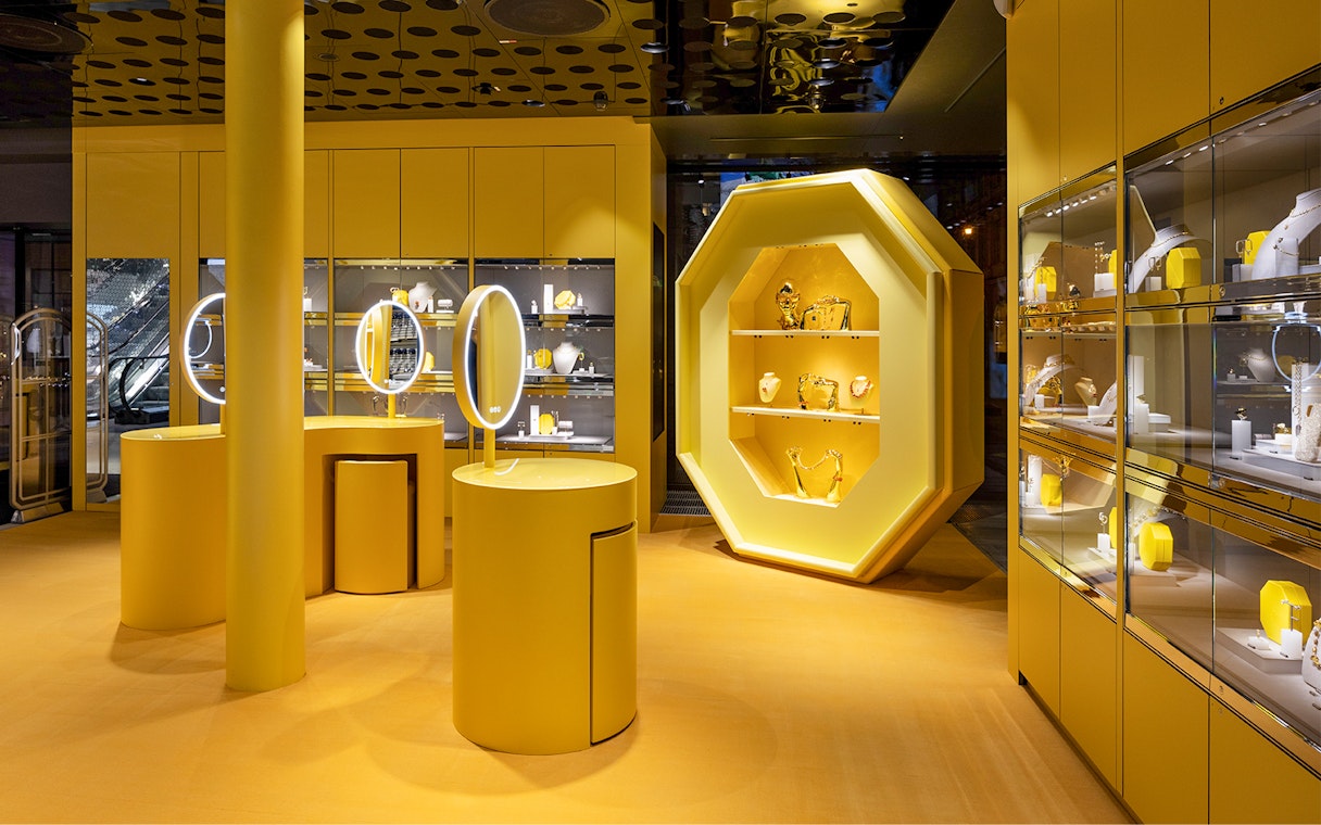 Swarovski House interior in Vienna showcasing jewelry displays and illuminated mirrors.