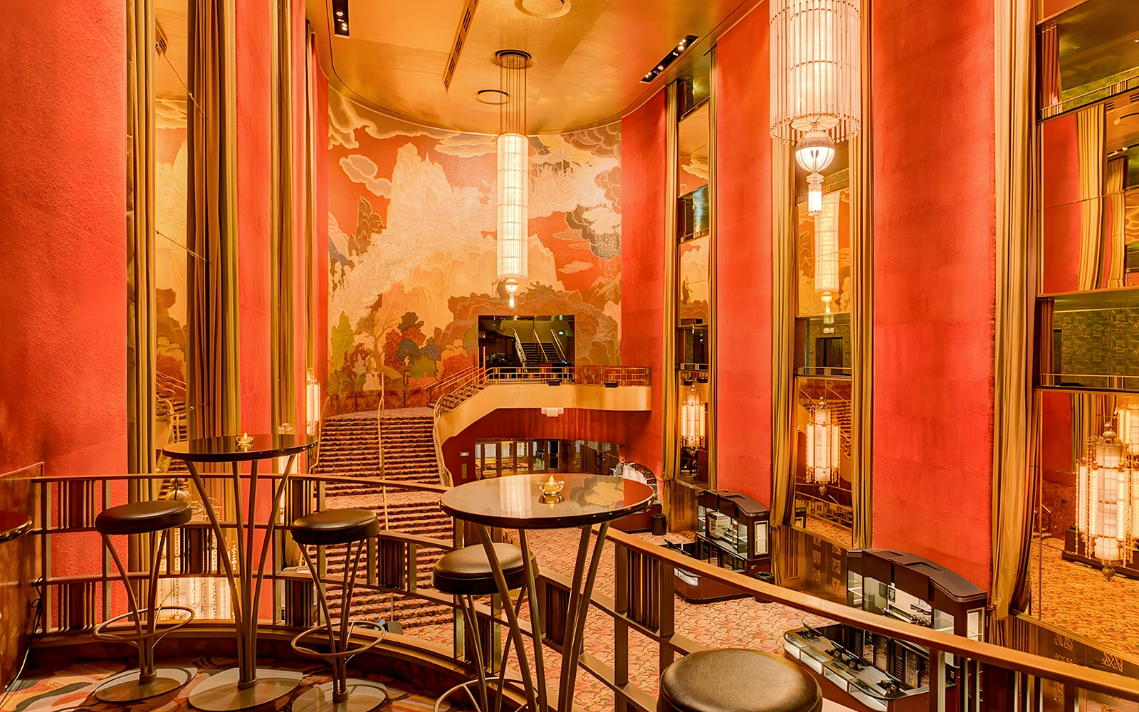 Radio City Music Hall interior with art deco design and grand staircase.