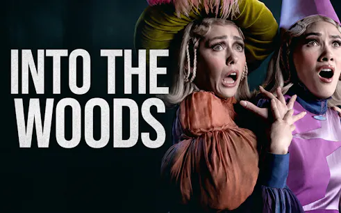 Actors in costume express surprise in a scene from "Into the Woods" musical.