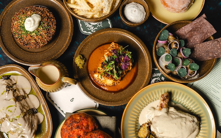 Assorted gourmet dishes at The Emerald Room party.