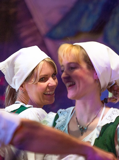 Traditional Tyrolean dancers in folk attire at the Gundolf Family show.