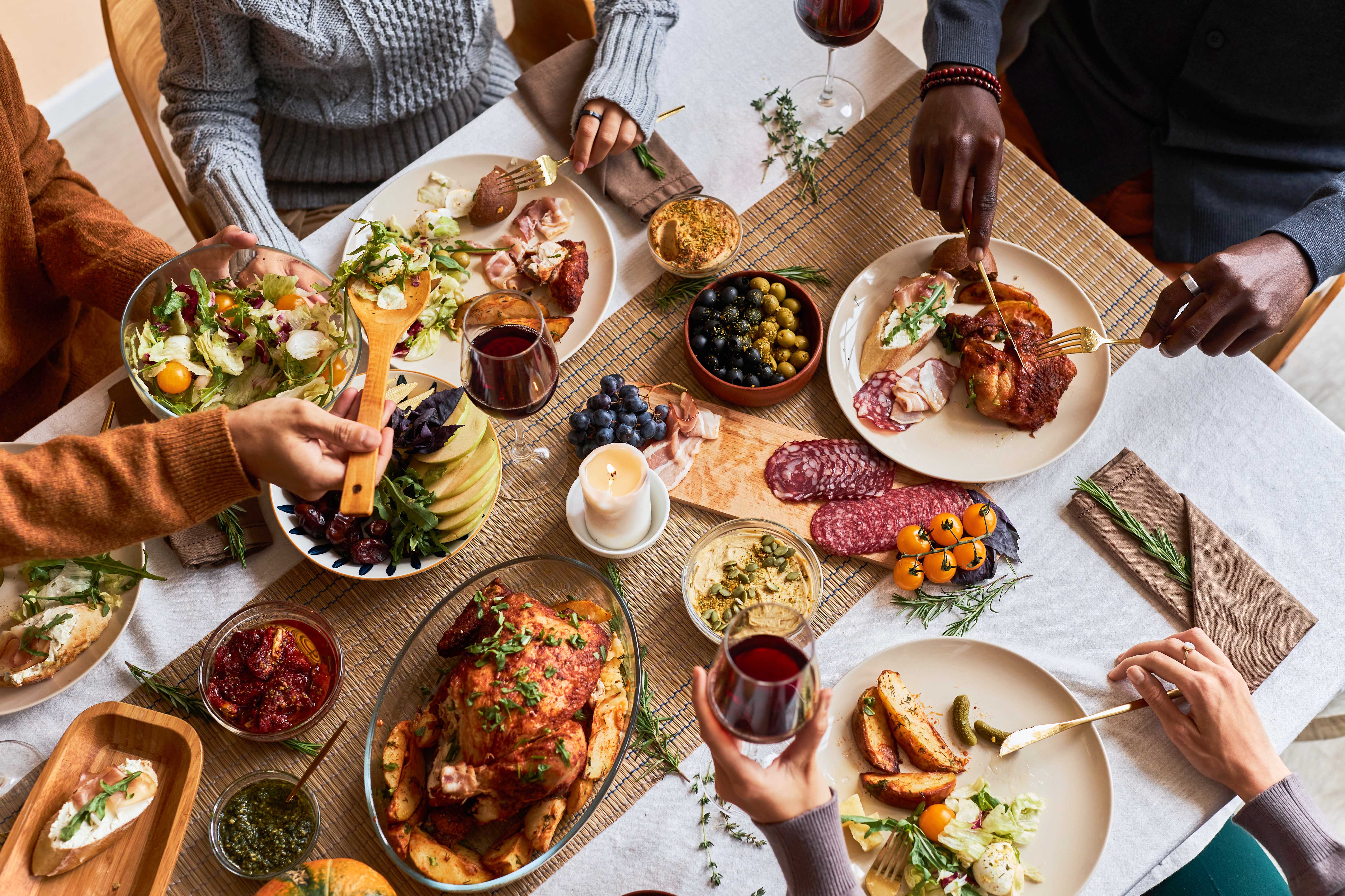 Group of friends enjoying a festive Thanksgiving dinner