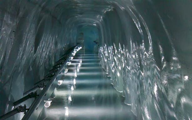 Ice tunnel passage on Top of Europe Small Group Tour.