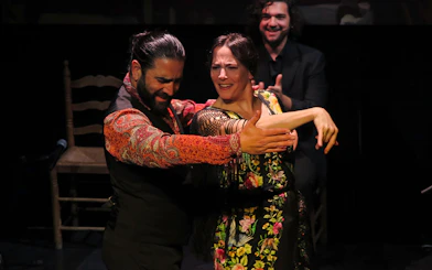 Flamenco dancers performing at Triana Theater in Seville.