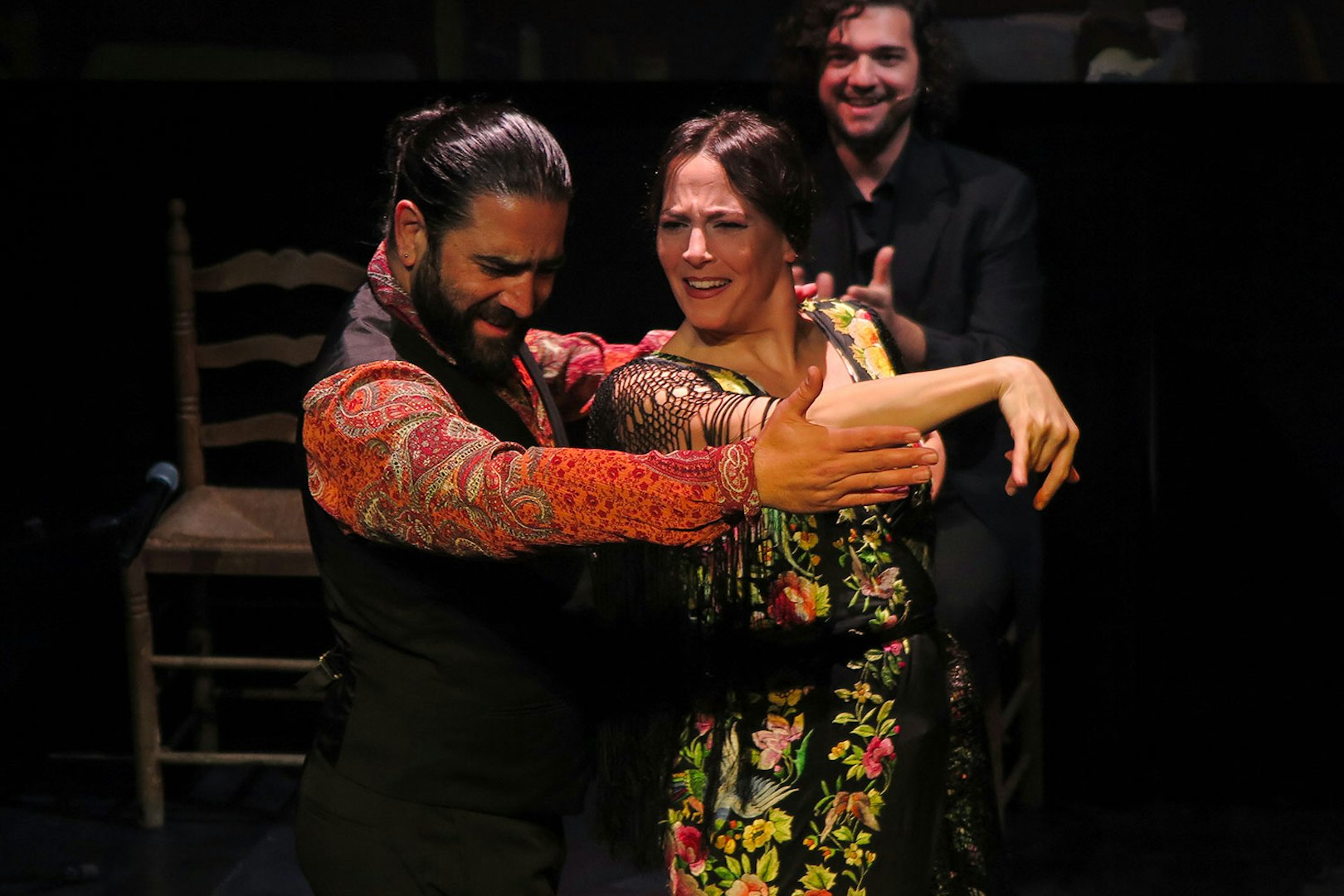 Flamenco dancers performing at Triana Theater in Seville.
