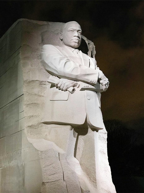 Martin Luther King Jr. Memorial statue at night, Washington, DC.