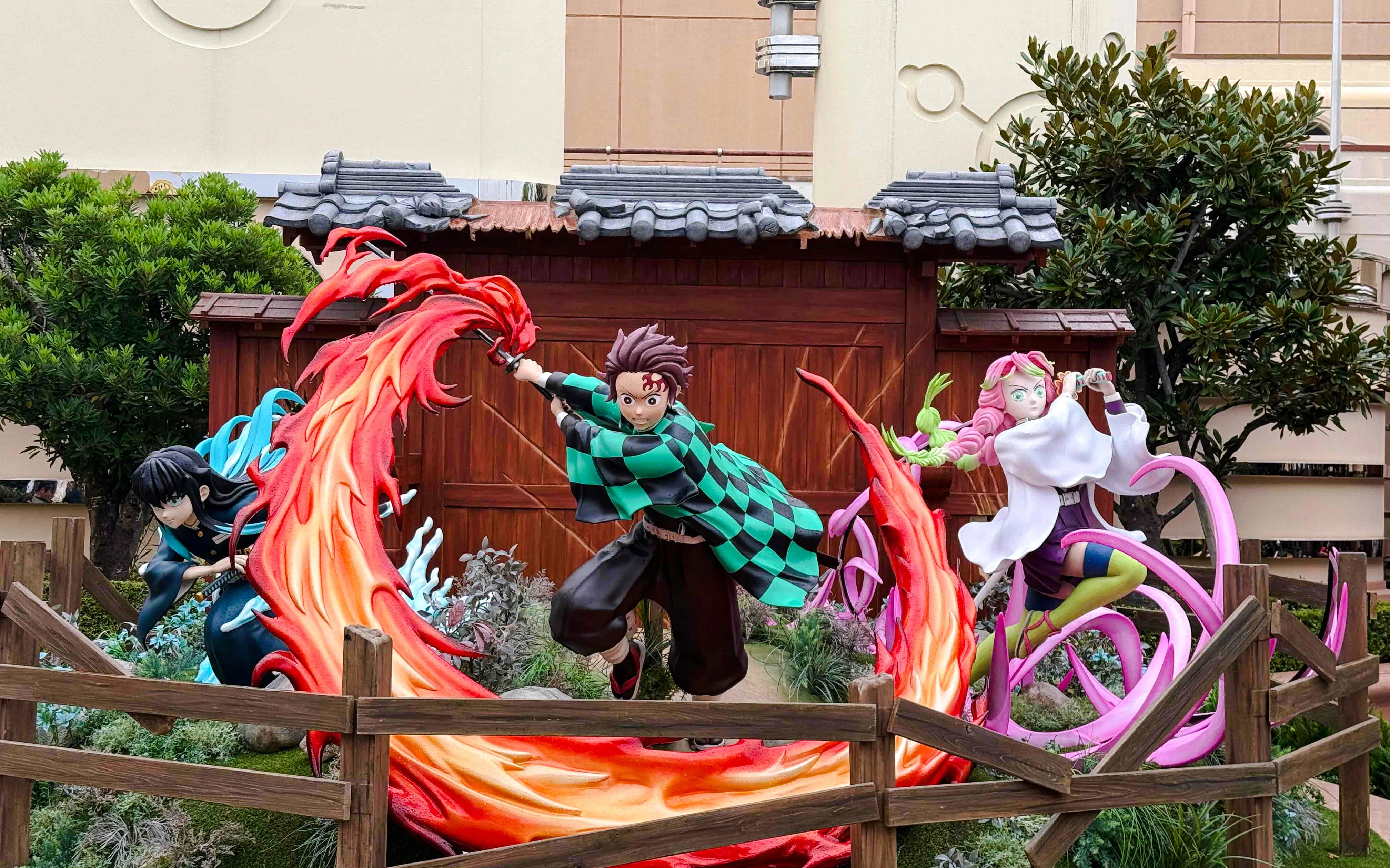 Life-sized Demon Slayer characters display with vibrant action poses.
