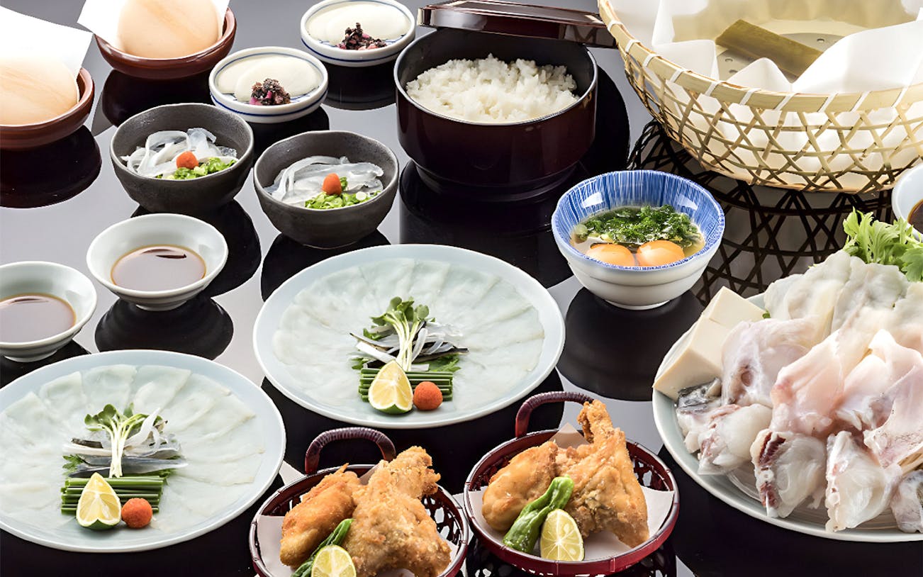 Puffer fish dishes at Torafugu-tei Ginza, including hot pot and sashimi.