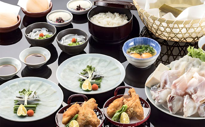 Puffer fish dishes at Torafugu-tei Ginza, including hot pot and sashimi.