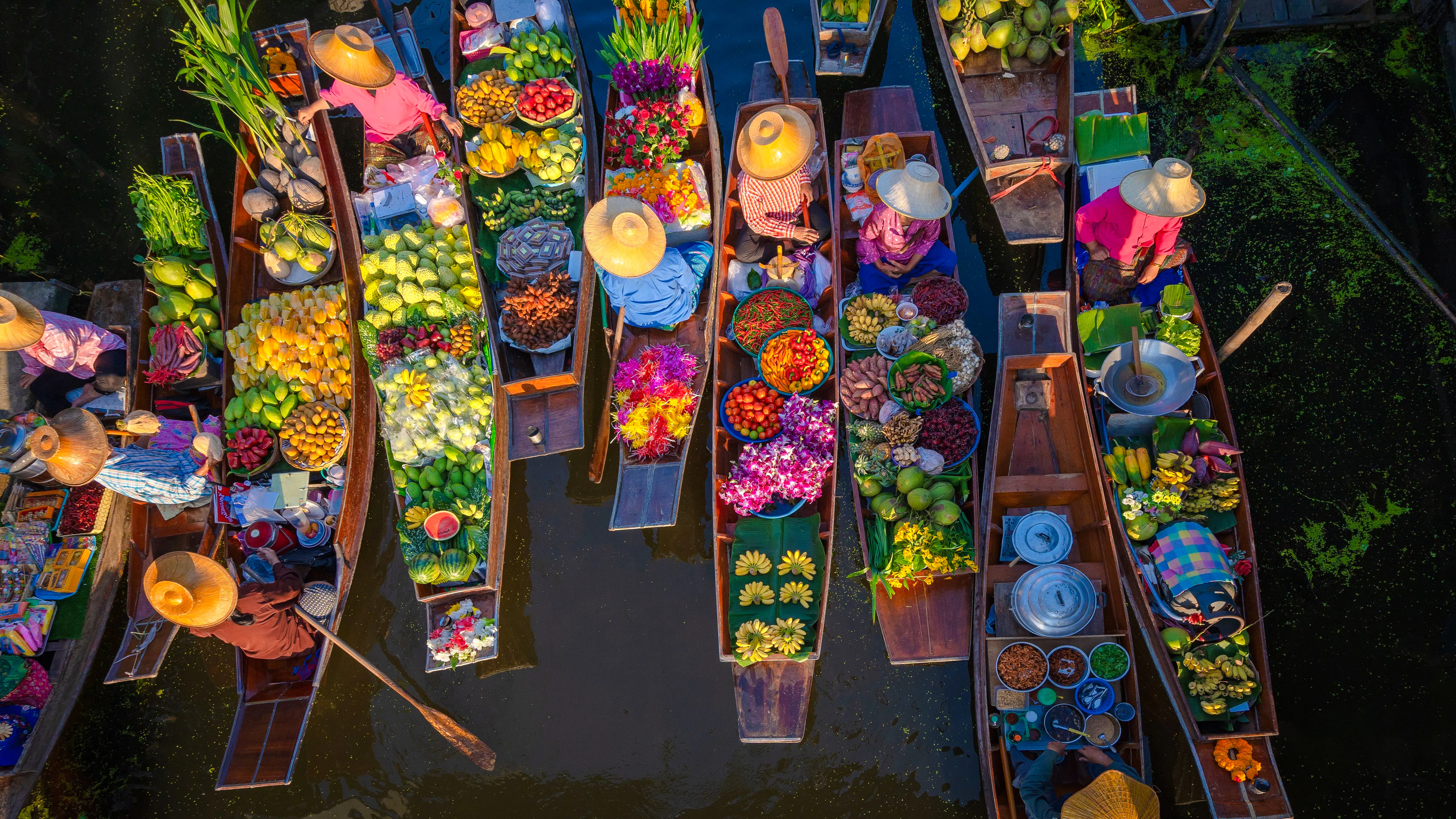 Floating market boats with fruits and flowers, Pattaya city tour.