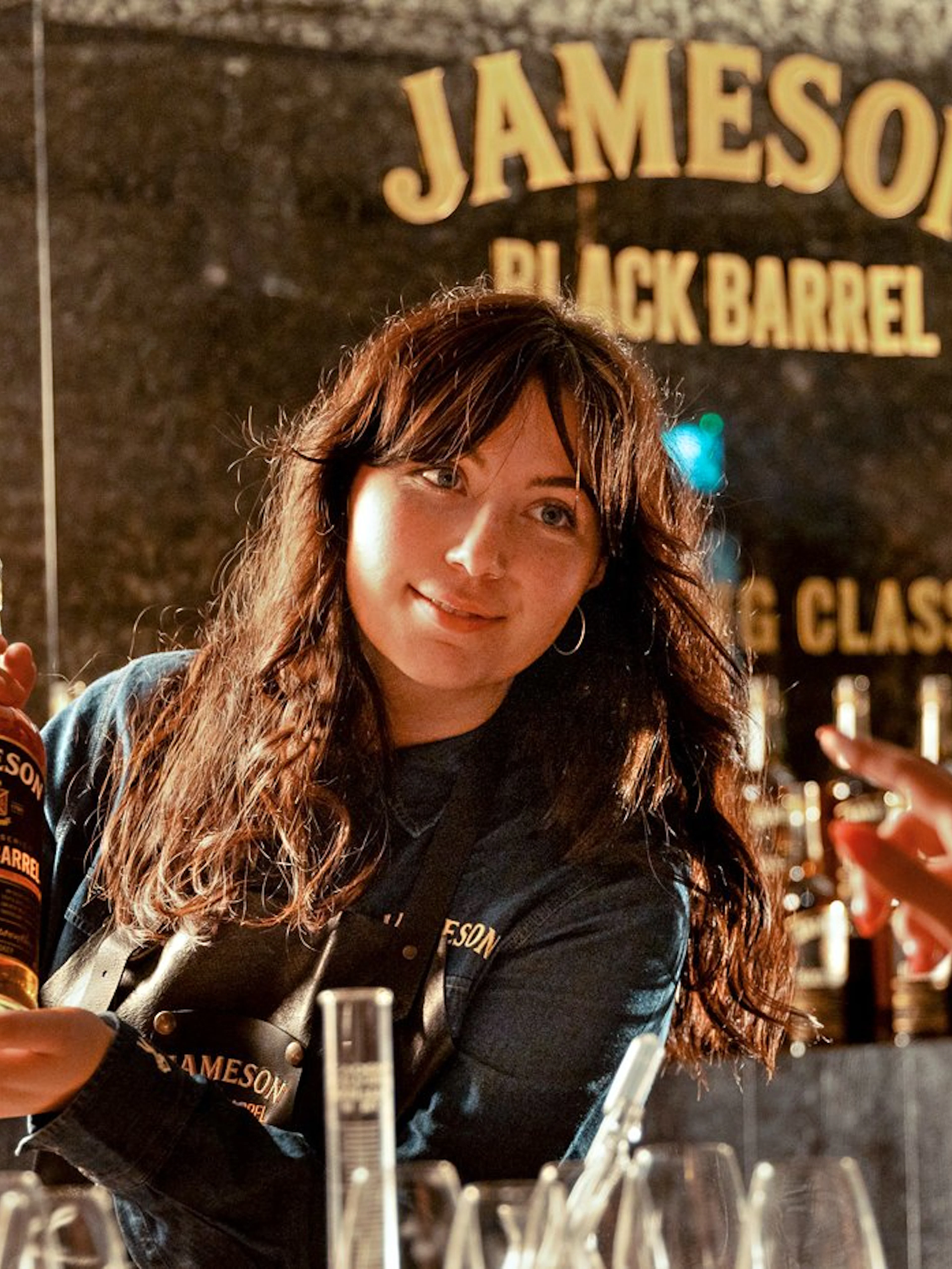 Whiskey expert presenting Jameson Black Barrel during blending masterclass.