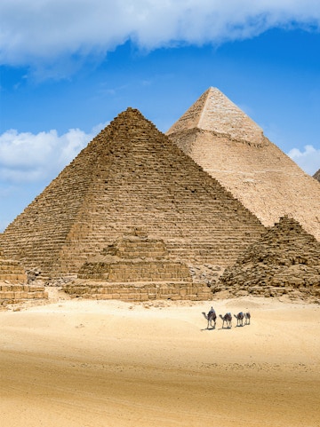Pyramids of Giza with camels in the foreground, Egypt.