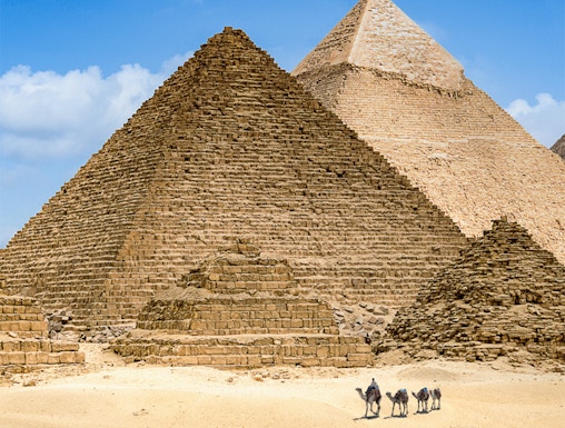 Pyramids of Giza with camels in the foreground, Egypt.
