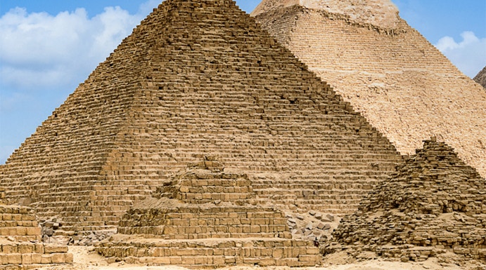 Pyramids of Giza with camels in the foreground, Egypt.