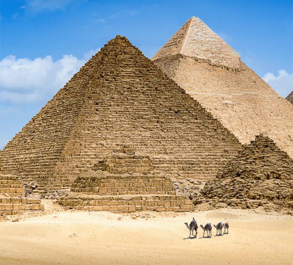 Pyramids of Giza with camels in the foreground, Egypt.