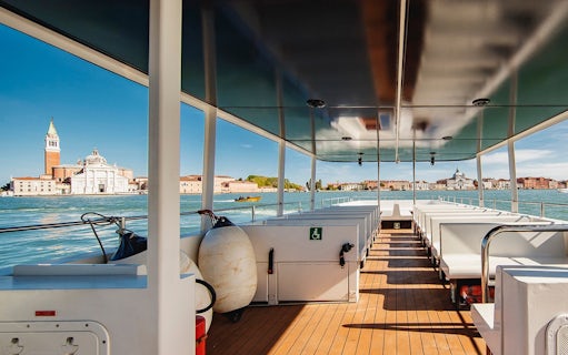 Interior of Venice Panoramic Boat Tour with view of San Giorgio Maggiore.