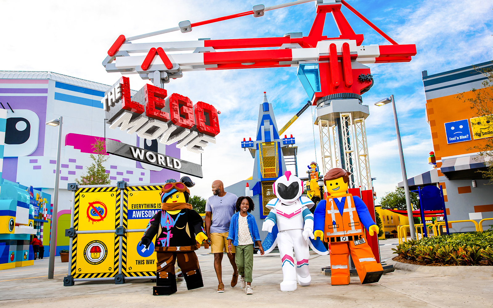 Visitors walking with LEGO characters at The LEGO Movie World, LEGOLAND® California.