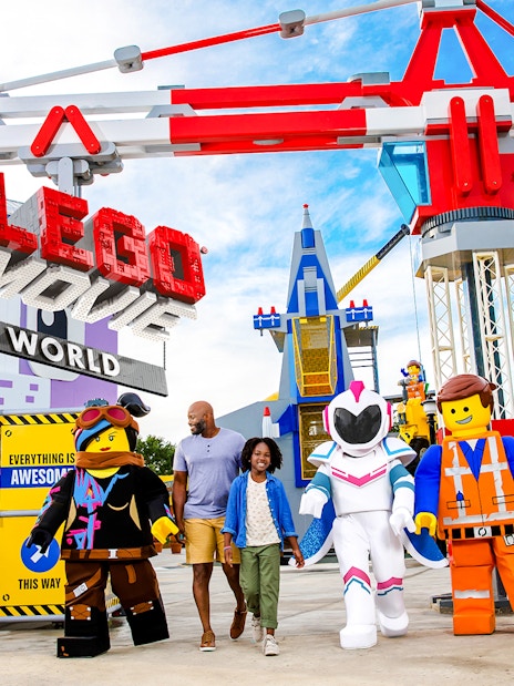 Visitors walking with LEGO characters at The LEGO Movie World, LEGOLAND® California.