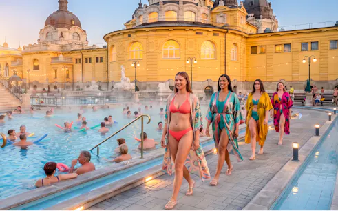 Fashion show at Széchenyi Thermal Bath during Hungarian Grand Prix, models walking by the pool.