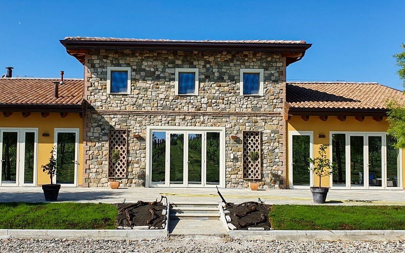 Stone building exterior at a vinegar cellar, location for guided tastings.