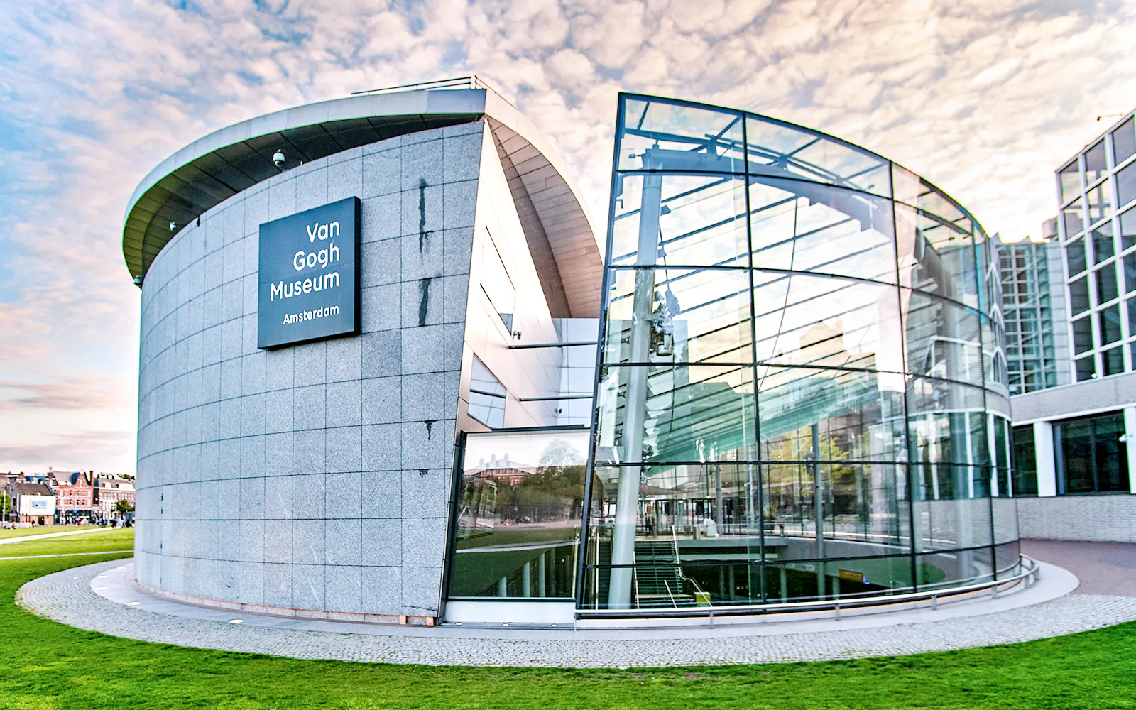 Van Gogh Museum exterior with modern glass facade in Amsterdam.