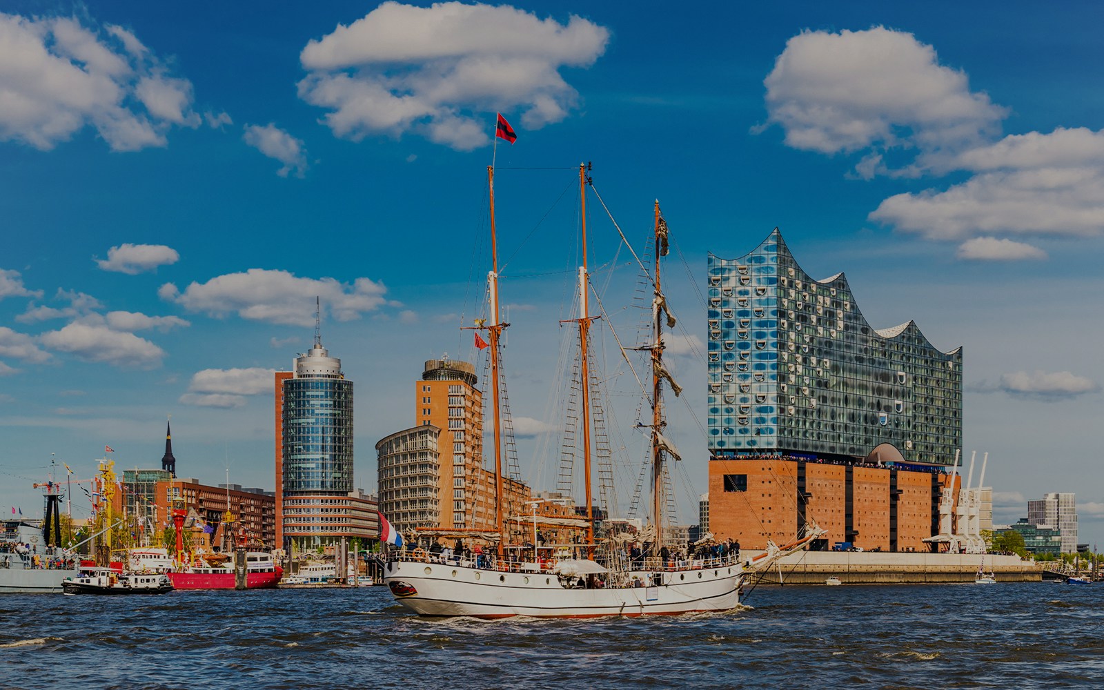 Hamburg Harbor Cruise with Elbphilharmonie in the background, showcasing the iconic concert hall.