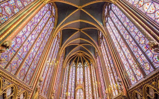 Stained glass windows and vaulted ceiling of Sainte-Chapelle, Paris.