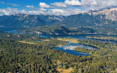 Panoramic view of forests, lakes, and mountains along Circuito Chico in Argentina.