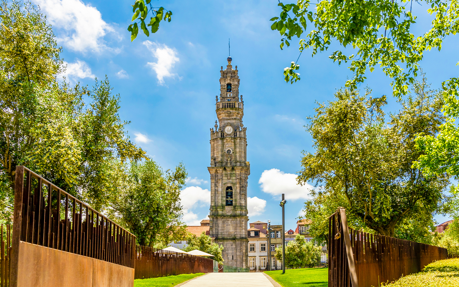 Clerigos Tower surrounded by trees in Porto, Portugal.