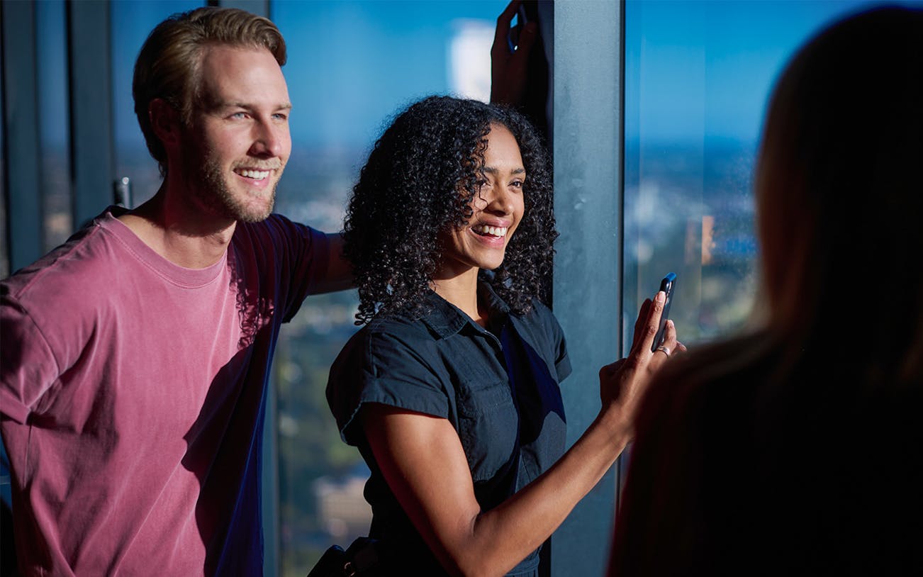 Visitors enjoying the view from Melbourne Skydeck.