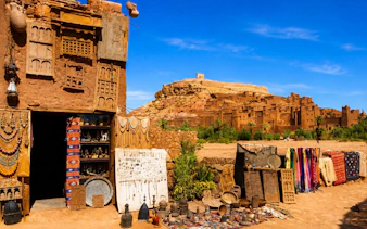 Traditional souvenir shop in Ait Benhaddou, near Ouarzazate, Marrakech, Morocco, with local crafts displayed.
