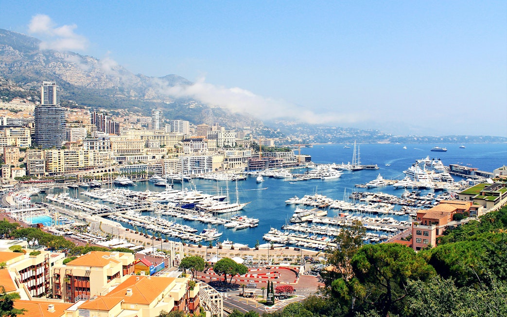 Monaco harbor view with yachts and cityscape, part of the Monaco day tour from Nice.