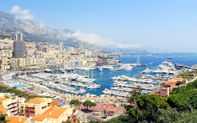 Monaco harbor view with yachts and cityscape, part of the Monaco day tour from Nice.